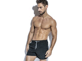 Short de baño básico con bolsillo de microfibra